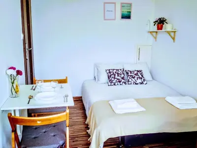 Łóżko lub łóżka w pokoju w obiekcie Vitalia Apart Rooms Bobrowiecka