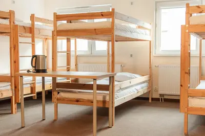 Łóżko lub łóżka w pokoju w obiekcie Luxhostel24 Warsaw