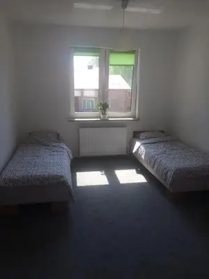 Łóżko lub łóżka w pokoju w obiekcie Noclegi u Ireny