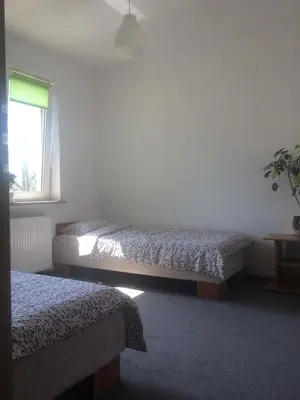 Łóżko lub łóżka w pokoju w obiekcie Noclegi u Ireny