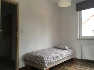 Łóżko lub łóżka w pokoju w obiekcie Noclegi u Ireny