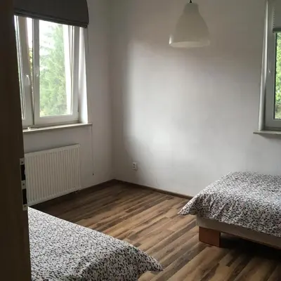 Łóżko lub łóżka w pokoju w obiekcie Noclegi u Ireny
