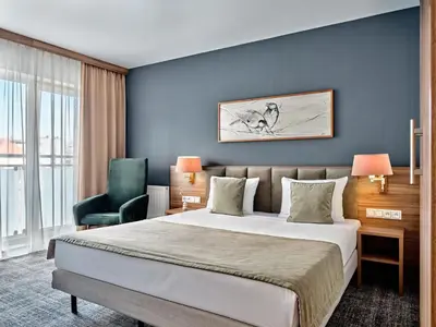 Łóżko lub łóżka w pokoju w obiekcie Arche Hotel Puławska Residence Warszawa