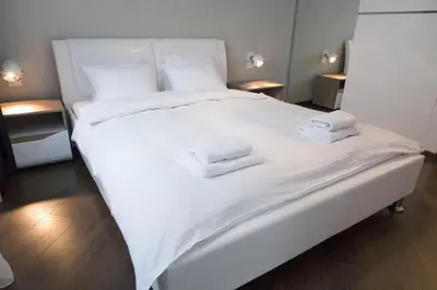 Łóżko lub łóżka w pokoju w obiekcie Apartament Moniuszki by Your Freedom