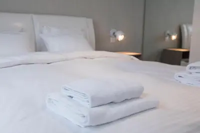 Łóżko lub łóżka w pokoju w obiekcie Apartament Moniuszki by Your Freedom