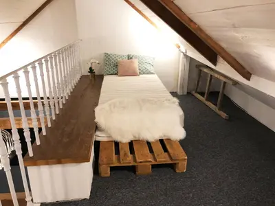 Łóżko lub łóżka w pokoju w obiekcie Bednarska 18 - Loft by Homeprime