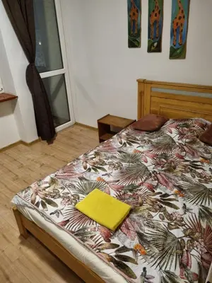 Łóżko lub łóżka w pokoju w obiekcie Kwatera na Wspólnej