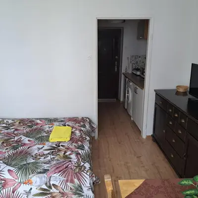 Łóżko lub łóżka w pokoju w obiekcie Kwatera na Wspólnej