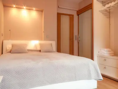 Łóżko lub łóżka w pokoju w obiekcie Luxury PRIMA Apartment City Nowy Świat