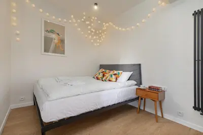 Łóżko lub łóżka w pokoju w obiekcie Premium Designed Apartment - Noakowskiego 16 by Noclegi Renters