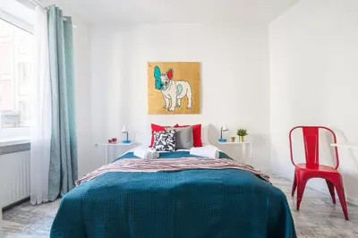 Łóżko lub łóżka w pokoju w obiekcie Functional Studio Apartment in Warsaw Center by Noclegi Renters