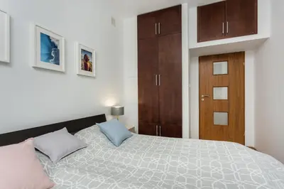 Łóżko lub łóżka w pokoju w obiekcie ShortStayPoland Krucza (B34)