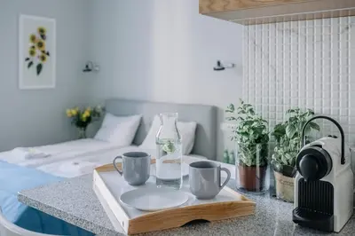 Łóżko lub łóżka w pokoju w obiekcie APARTEL Plac Unii Lubelskiej Studio