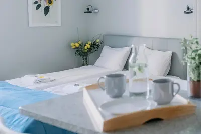 Łóżko lub łóżka w pokoju w obiekcie APARTEL Plac Unii Lubelskiej Studio