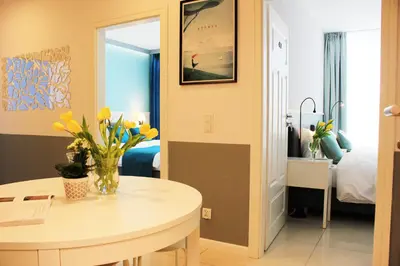 Łóżko lub łóżka w pokoju w obiekcie JessApart – Ochota Apartments