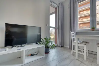 Telewizja i/lub zestaw kina domowego w obiekcie Airport Residence Green