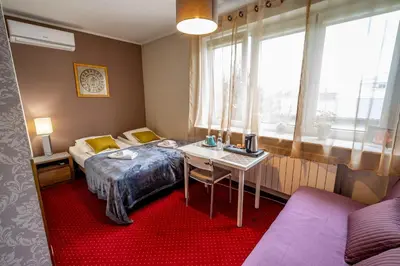 Łóżko lub łóżka w pokoju w obiekcie Villa Kava
