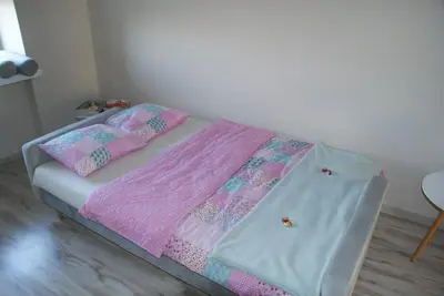 Łóżko lub łóżka w pokoju w obiekcie Apartament Grochowska Warszawa