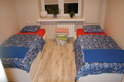Łóżko lub łóżka w pokoju w obiekcie Apartament Grochowska Warszawa