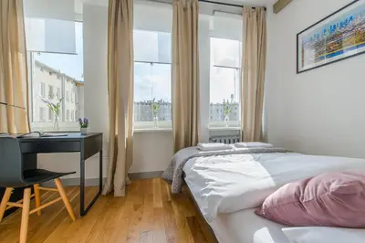 Łóżko lub łóżka w pokoju w obiekcie Dworzec Centralny P&O Serviced Apartments