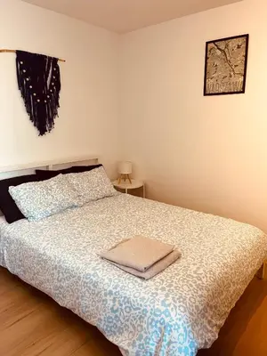 Łóżko lub łóżka w pokoju w obiekcie P11