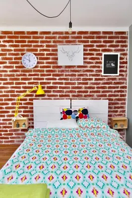 Łóżko lub łóżka w pokoju w obiekcie Apartament Twarda 54-Warszawski Sen