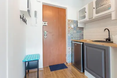 Kuchnia lub aneks kuchenny w obiekcie Apartament Twarda 54-Warszawski Sen