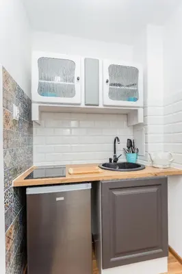 Kuchnia lub aneks kuchenny w obiekcie Apartament Twarda 54-Warszawski Sen
