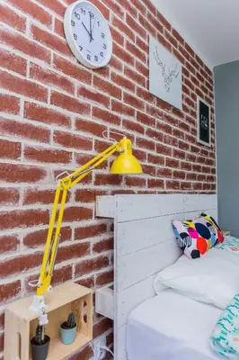 Łóżko lub łóżka w pokoju w obiekcie Apartament Twarda 54-Warszawski Sen
