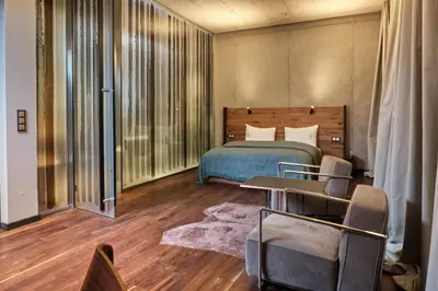Łóżko lub łóżka w pokoju w obiekcie Hotel Warszawa