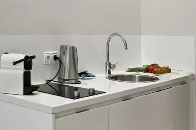 Kuchnia lub aneks kuchenny w obiekcie P&O Giełdowa Serviced Apartments