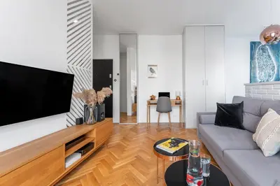 Telewizja i/lub zestaw kina domowego w obiekcie oompH Warsaw Central STREET ART Apartments