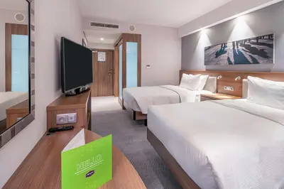 Telewizja i/lub zestaw kina domowego w obiekcie Hampton By Hilton Warsaw Mokotow