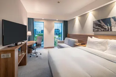 Telewizja i/lub zestaw kina domowego w obiekcie Hampton By Hilton Warsaw Mokotow