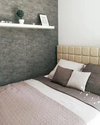 Łóżko lub łóżka w pokoju w obiekcie Manufaktura
