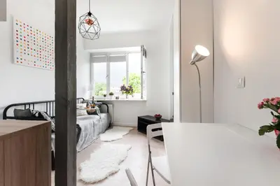 Łóżko lub łóżka w pokoju w obiekcie SuperApart Chełmska 22 - Blisko Olinek i WFDIF