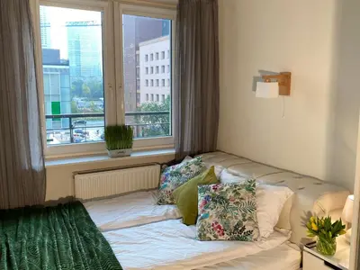 Łóżko lub łóżka w pokoju w obiekcie Good Time Apartments - Warsaw Zgoda