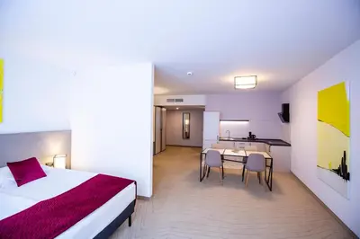 Łóżko lub łóżka w pokoju w obiekcie Arche Hotel Krakowska