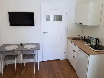 Kuchnia lub aneks kuchenny w obiekcie Apartamenty METRO Targówek