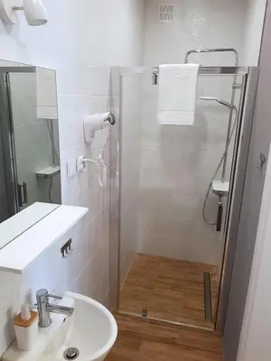 Łazienka w obiekcie Apartamenty METRO Targówek