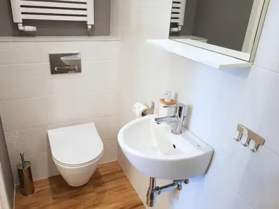 Łazienka w obiekcie Apartamenty METRO Targówek