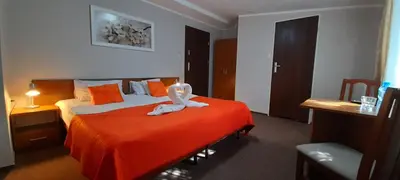 Łóżko lub łóżka w pokoju w obiekcie Astral