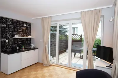 Telewizja i/lub zestaw kina domowego w obiekcie Saska Kępa Apartamenty