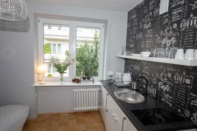 Kuchnia lub aneks kuchenny w obiekcie Saska Kępa Apartamenty