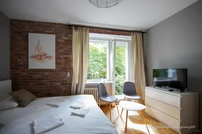 Telewizja i/lub zestaw kina domowego w obiekcie Saska Kępa Apartamenty