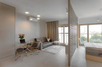 Łóżko lub łóżka w pokoju w obiekcie Mennica Residence