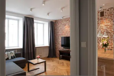 Telewizja i/lub zestaw kina domowego w obiekcie Red Brick Old Town Apartment