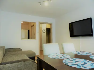 Telewizja i/lub zestaw kina domowego w obiekcie Hosapartments City Center