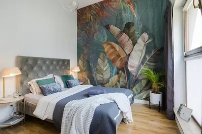 Łóżko lub łóżka w pokoju w obiekcie Woronicza Premium - Jungle Warsaw