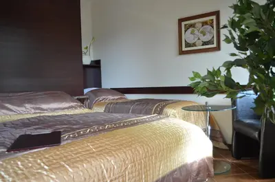 Łóżko lub łóżka w pokoju w obiekcie Camping Motel WOK
